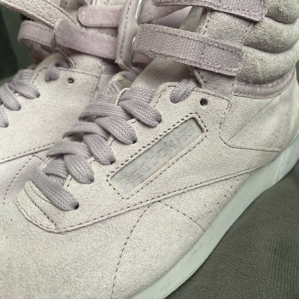 Reebok high tops (light lavender in color)